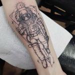 daz-crane-astronaut-forearm-tattoo-blackwork