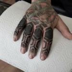 daz-crane-knuckles-tattoo-dot-work
